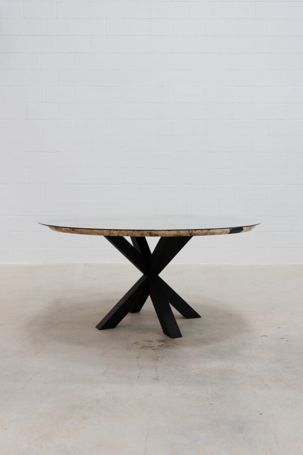 Hand-crafted mappa burl dining room table with a blackened ash base.
