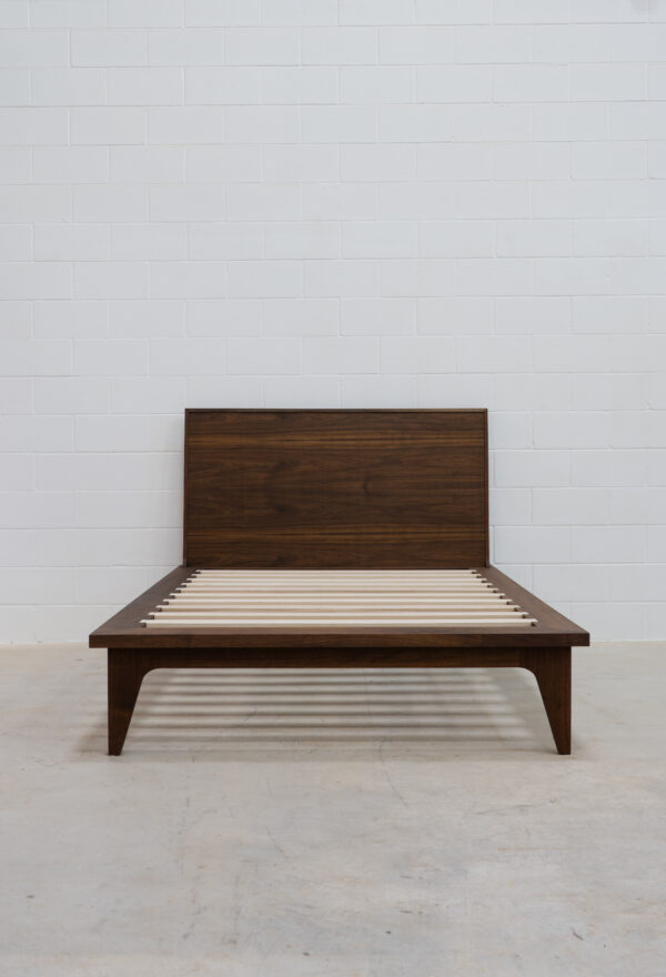 wooden hand-crafted floating bed with precision dovetail inlaid ash slats.