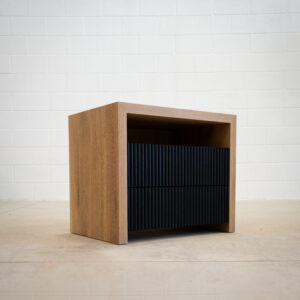 contemporary styling wooden nightstand with natural wood and black drawers, allowing for contrasting colours.