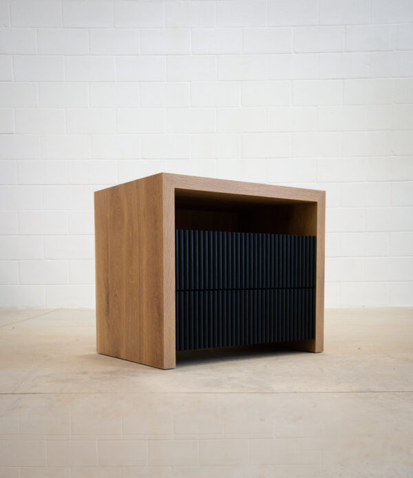 contemporary styling wooden nightstand with natural wood and black drawers, allowing for contrasting colours.